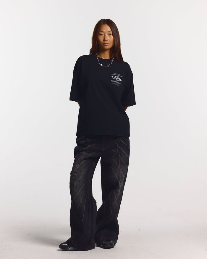 SPARKLY TEE BLACK - black graphic print tee, front view on female model - Cold Culture #woman