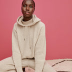Front image of a woman standing wearing the Addison Jogger—Cashmere/Wool in Oatmeal Melange