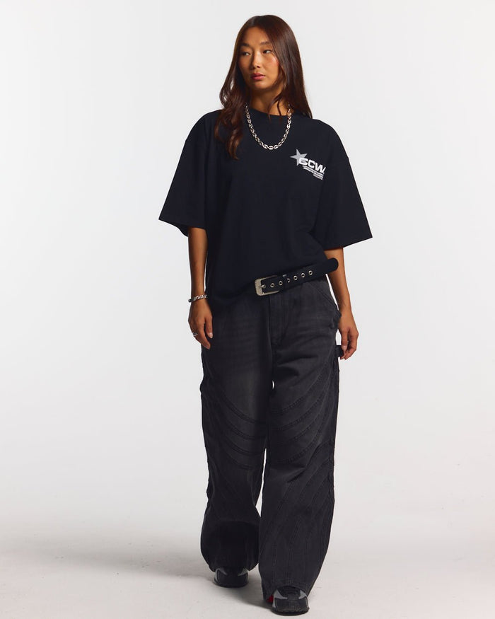 ASTRO TEE BLACK - black star print tee, front view on female model - Cold Culture #woman