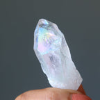 hand holding Aura Quartz Point Wand