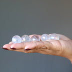 5 auara quartz balls on the palm