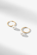 still image of the Claude Charms in Gold on the claressa hoop small in gold | Grid
