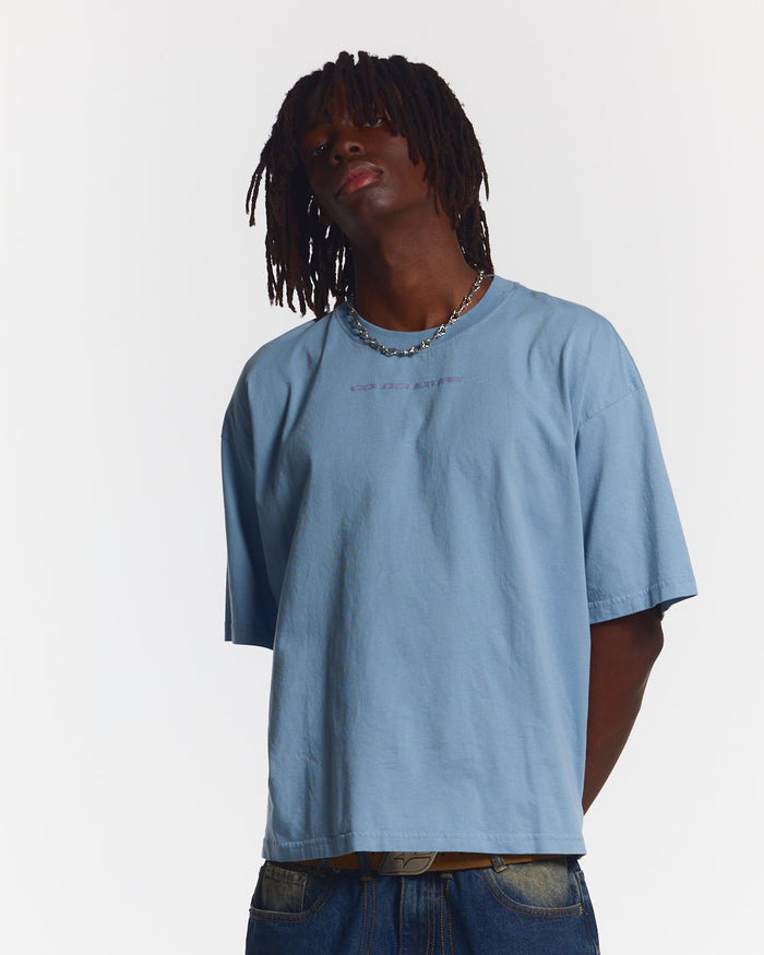 COSMOS ARC TEE SHADY BLUE - light blue oversized tee, front view on male model - Cold Culture #man