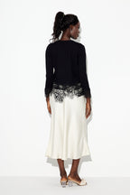 Eadred Lace Plunge Knit Top In Black