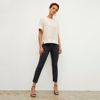Front image of a woman standing wearing the Finley Legging—Ribbed Jardigan Knit in Black | Lead