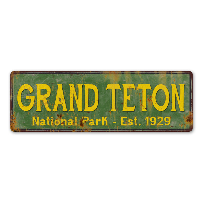 Grand Teton National Park rustic metal sign with distressed vintage lettering, ideal for cabin or lodge wall decor