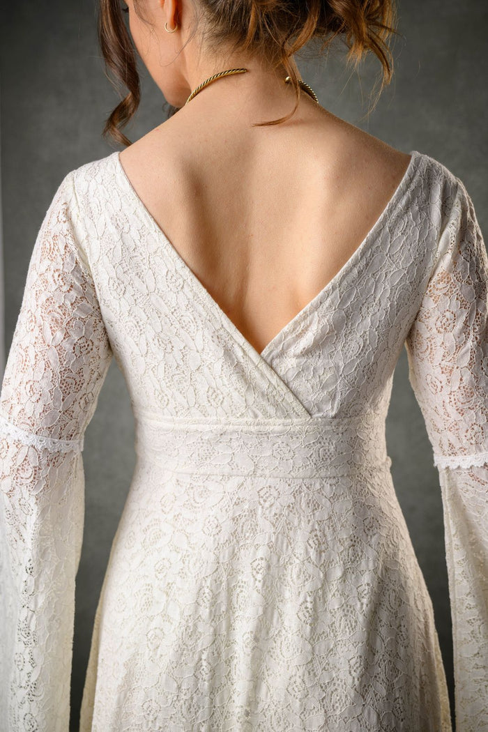 Ivory cotton lace romantic wedding dress with low V back, floral lace bodice and cotton trim details