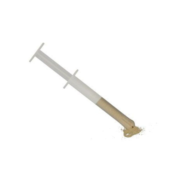 Celox-A Hemostatic Agent with a visible applicator and granules exiting the applicator.