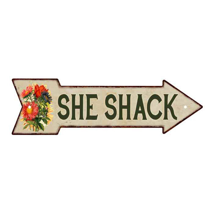 Vintage-style She Shack arrow metal sign with flowers, a rustic accent for she sheds and garden decor